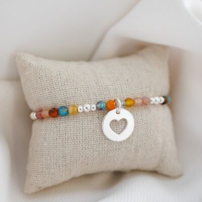 Bracelet perle facettées élastique et pastille ajourée coeur