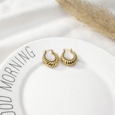 Thick gold hoop earrings