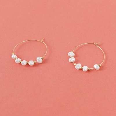 Golden hoop earrings with pearls