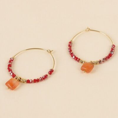 Golden hoop earrings with red pearls