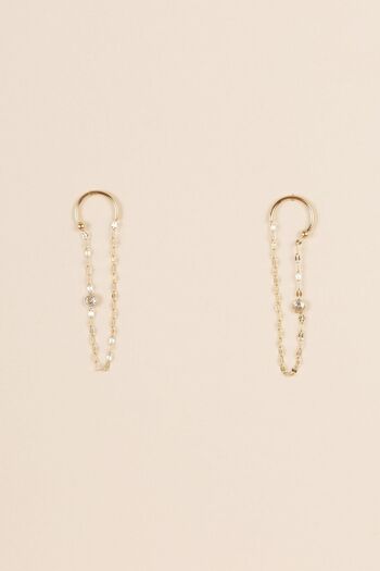 Boucles d'oreilles doré pendantes avec un strass de chaque côté en U a l'envers 1