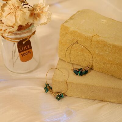 Creole earrings with green stones