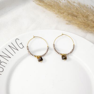 Golden hoop earrings with brown pearls
