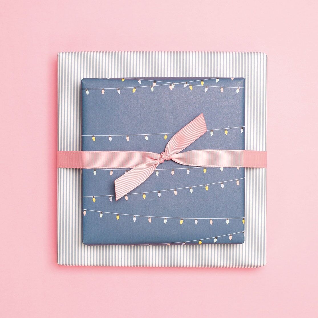 Blue wrapping paper with fairy lights and stripes, birthday wrapping paper with party lights for children and adults