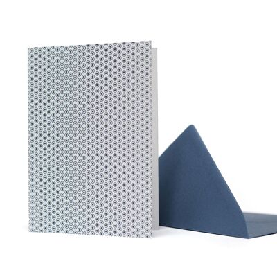 Greeting card with a neutral graphic blue polka dot pattern made from recycled paper for various occasions