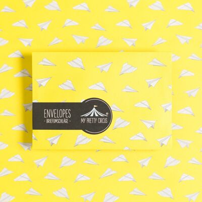 8 enveloppes en papier avions jaune