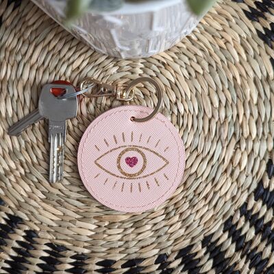 Pink round keyring "Eye of protection"