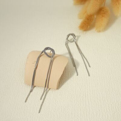 Silver bow dangling earrings