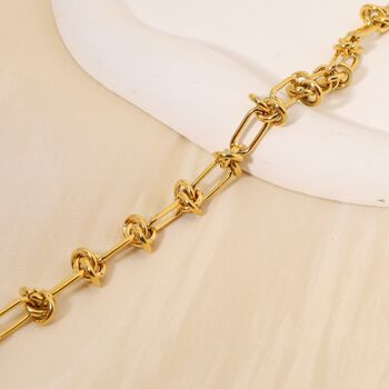 Bracelet doré maillons nœuds 1