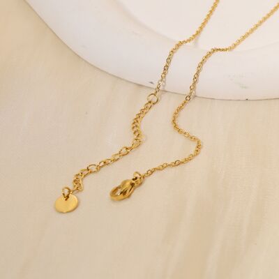 Golden crossed circle necklace