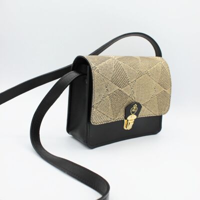 The small black bag with handcrafted gold fantasy leather