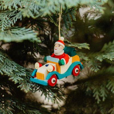 Gnomes in vintage cars as tree decorations