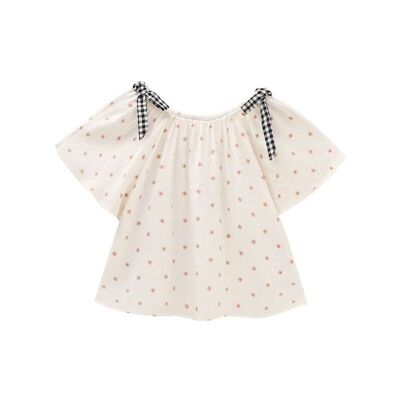 Girl's blouse with flower print and contrast bows