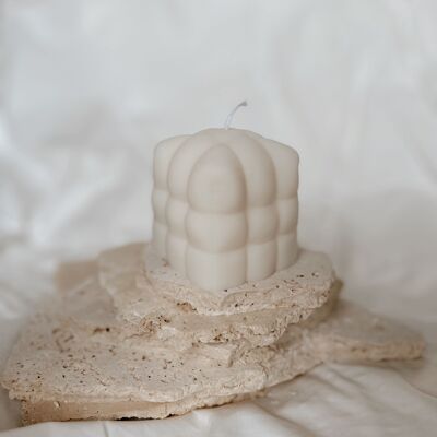 Decorative bubble candle in the shape of a quilted cube