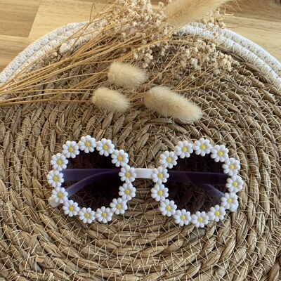 Pair of white daisy sunglasses