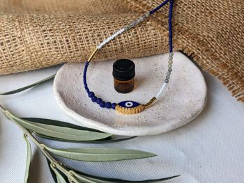 Collier diffuseur d'huiles essentielles bleu avec collier de perles mauvais œil en émail 2
