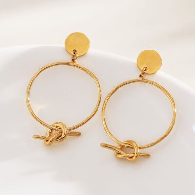 Dangling earrings with circle and knot