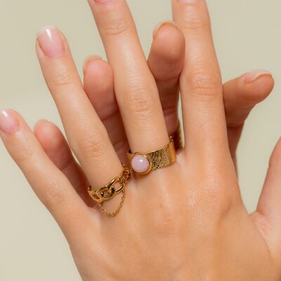 Adjustable golden ring with pink stone