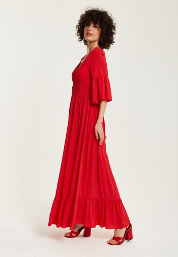 Robe longue rouge liqueur avec manches à volants 3