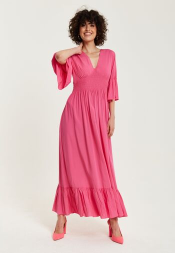 Robe longue rose liqueur avec manches à volants 1