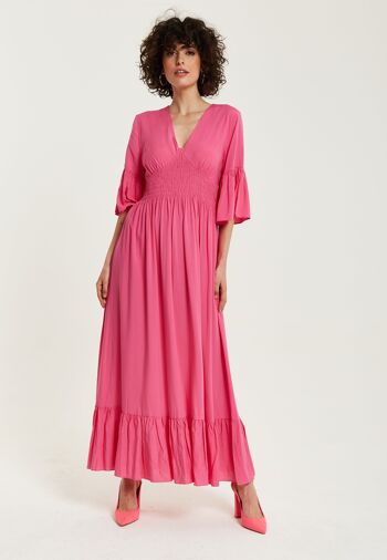 Robe longue rose liqueur avec manches à volants 3