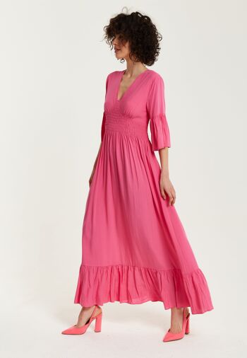 Robe longue rose liqueur avec manches à volants 4