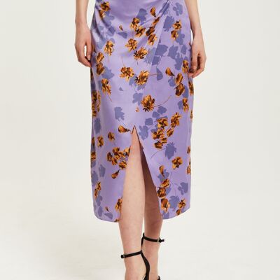 Falda a media pierna con detalle de pliegues y flores en violeta de Liquorish