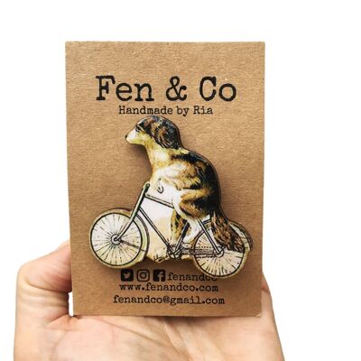 Whimsical cat or dog brooch - Dog on a bike