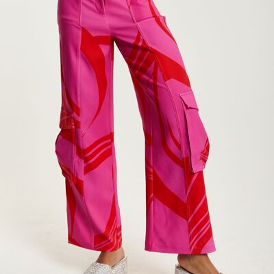 House of Holland pantalones cargo rosa y rojo con bolsillos laterales