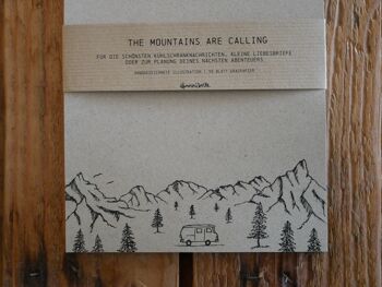 Bloc-notes en papier d'herbe campeurs dans les montagnes 2