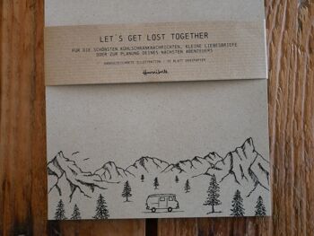 Bloc-notes en papier d'herbe campeurs dans les montagnes 6