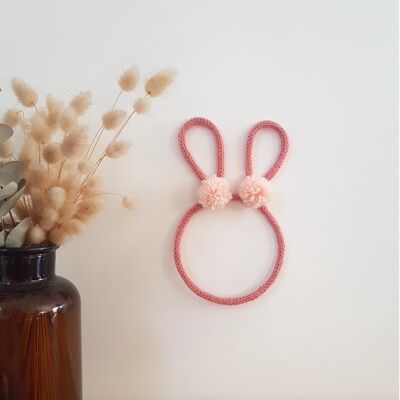 Knitted rabbit head decoration with pompoms for baby and child bedroom wall decoration