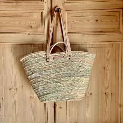 Straw tote basket with sewn leather handles