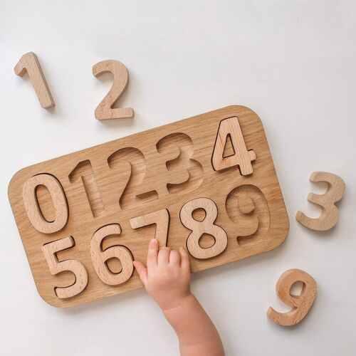 Numbers puzzle from solid wood