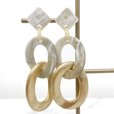 Real horn earrings. Color: golden