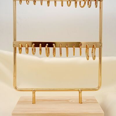 Set of earrings on golden display
