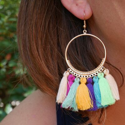 Golden hoop earrings and colored pompoms
