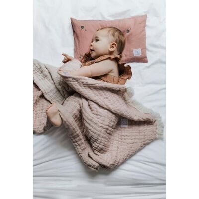 pink woven cotton blanket
