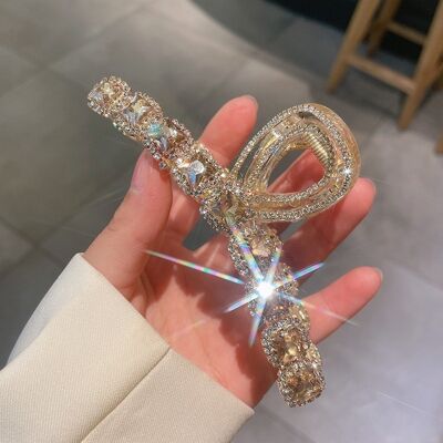 Pinza de pelo transparente con diamantes de imitación