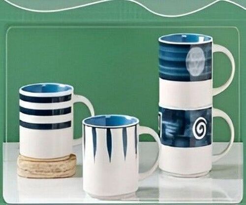 White mug with blue patterns in gift box