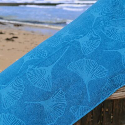 La fouta de plage en coton bio | Bleu plume de paon | Motif Fleur de Gingko