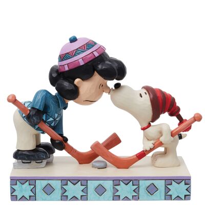 A Surprise Smooch (Snoopy and Lucy Playing Hockey Figurine) - Peanuts by Jim Shore