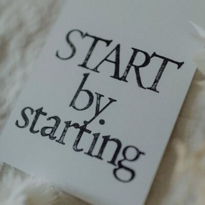 Stamped postcard "Start by starting"