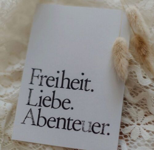 Gestempelte Postkarte "Freiheit Liebe Abenteuer"