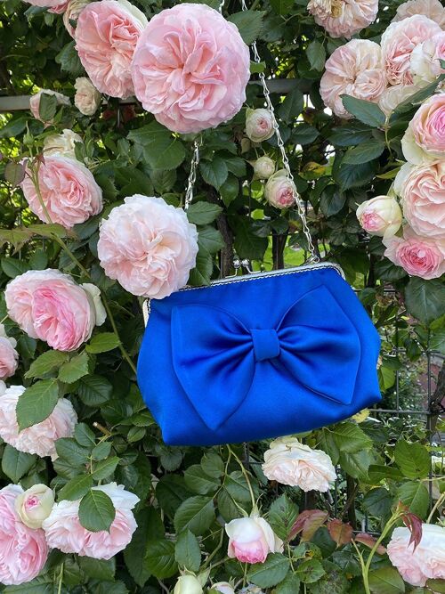 Sac FARNY bleu avec un gros noeud - style retro- bandoulière en  chaine argente'