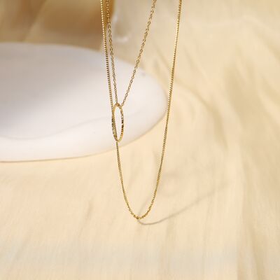 Double chain necklace with asymmetric oval