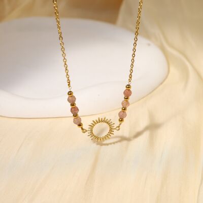 Collier avec chaîne avec pendentif soleil avec perles roses autour