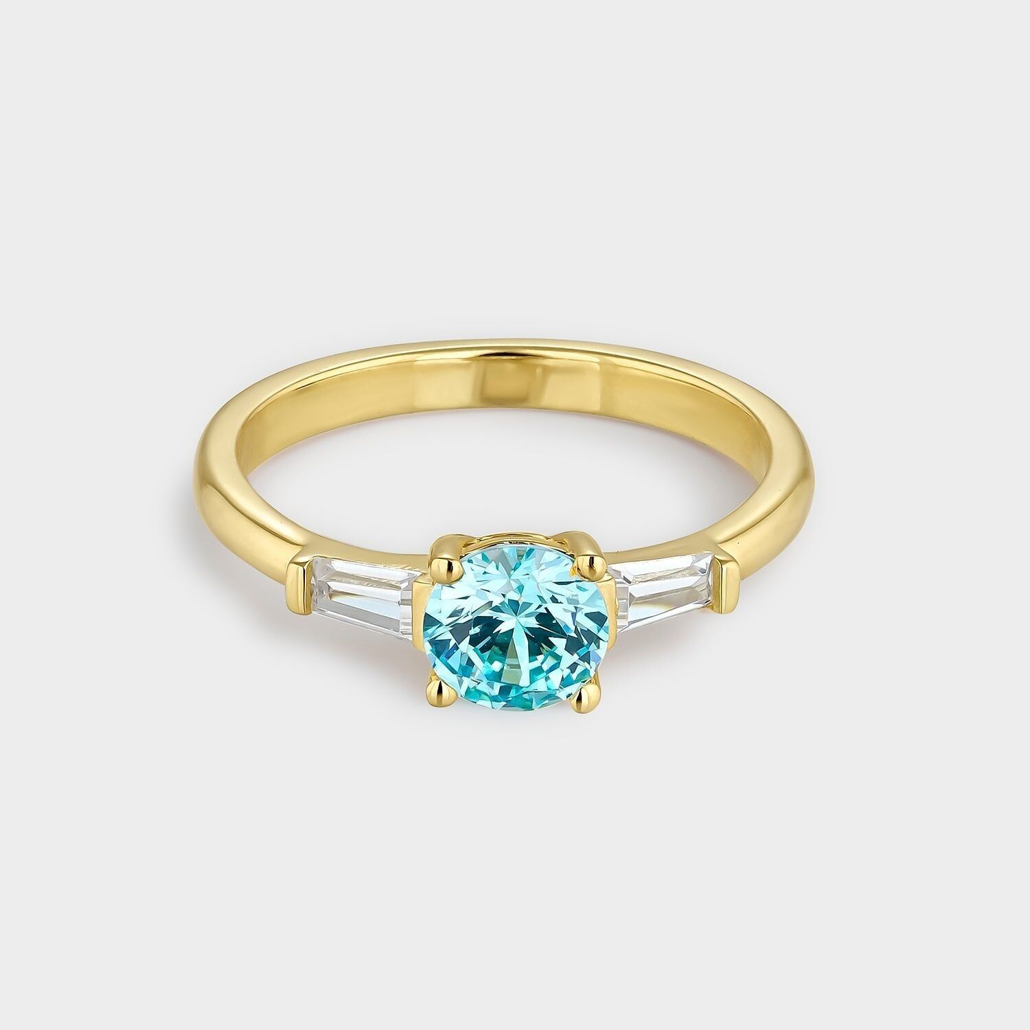 Bague trio avec zircon bleu aigue-marine