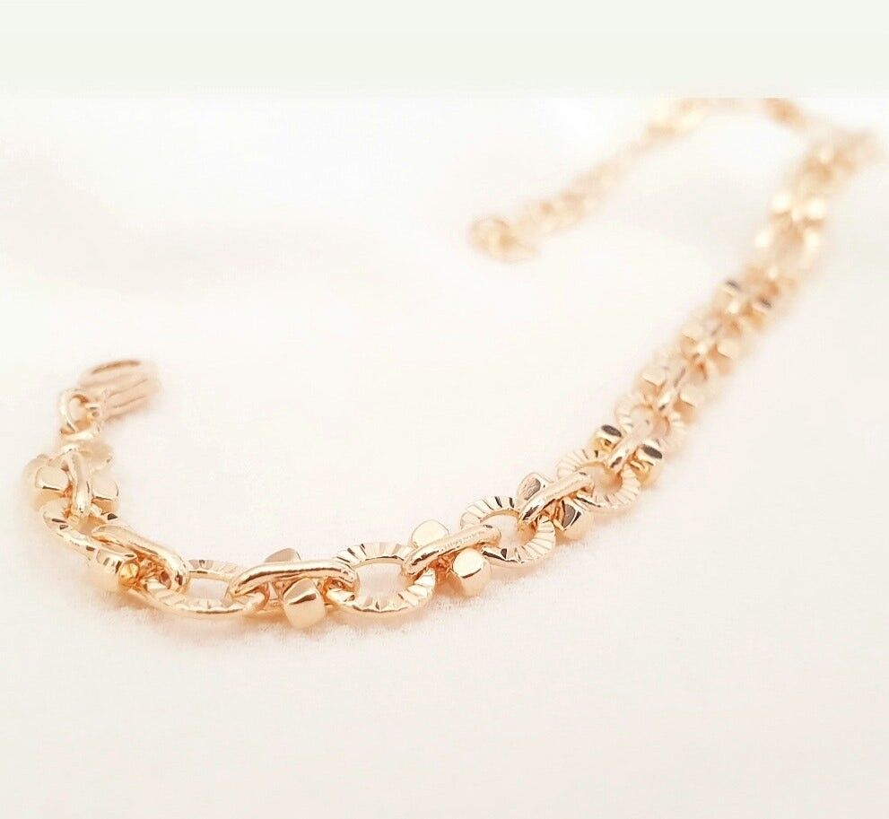 Bracciale placcato oro con piccole maglie ovali striate