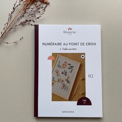 The numéraire in cross stitch to embroider oneself